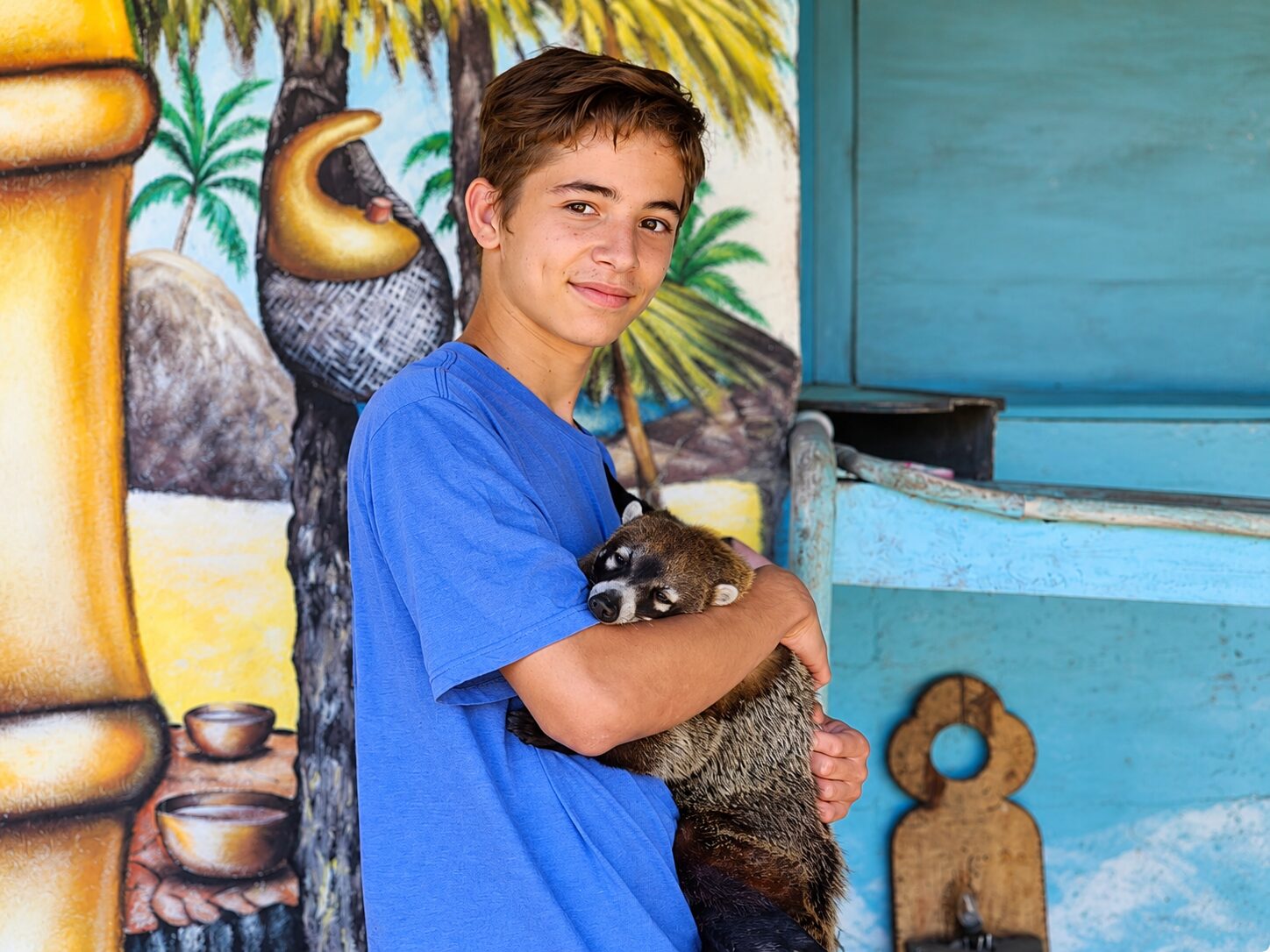 Jungla caregiver with a rescued animal at Jungla de Panama
